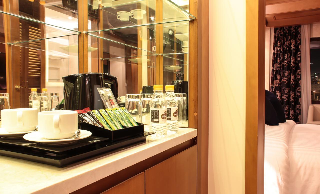 Thousand Nights Hotel Amman Luaran gambar A Nespresso machine in a hotel room